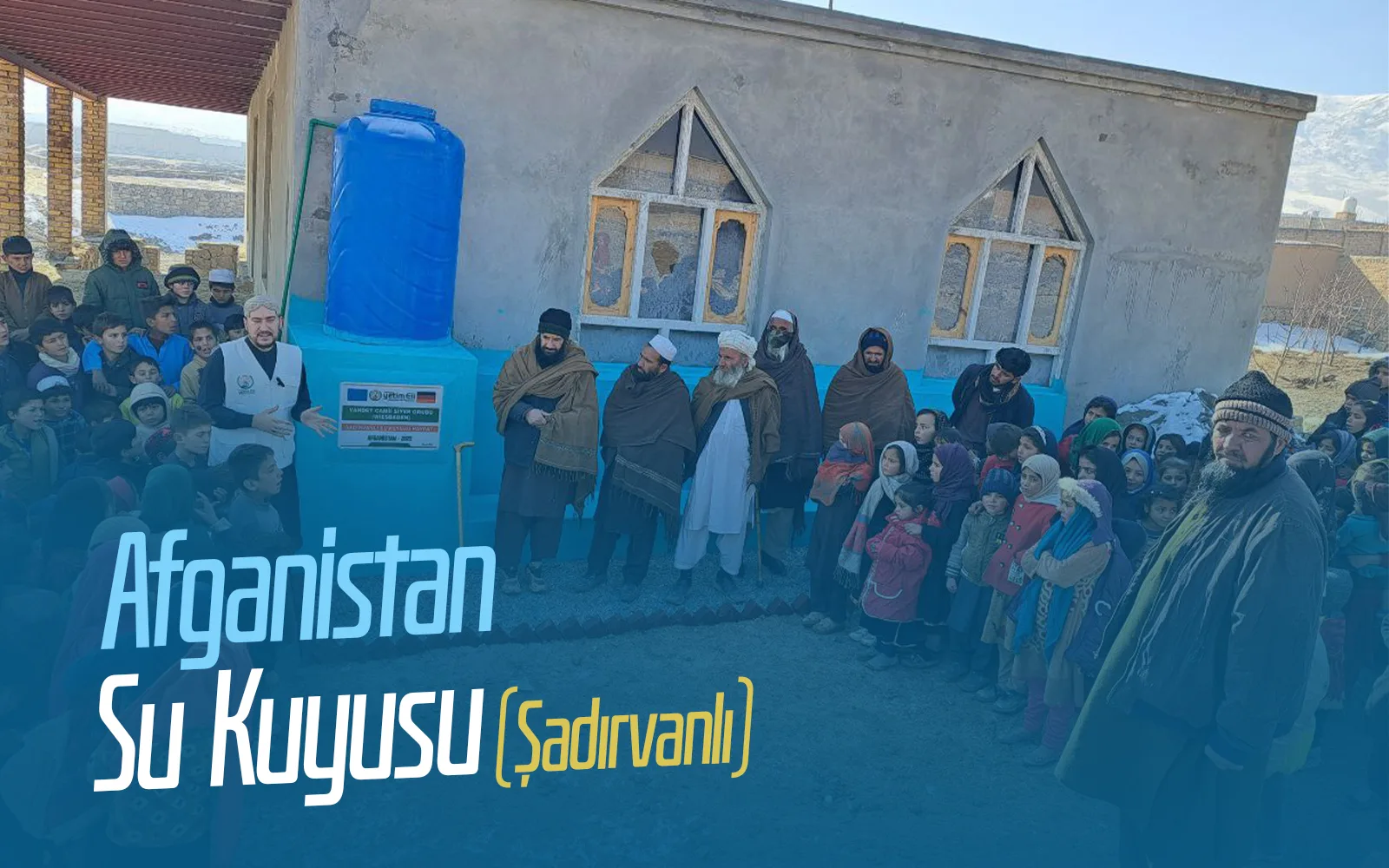 Worshippers performing wudu next to a mosque in Afghanistan, funded by a water well donation